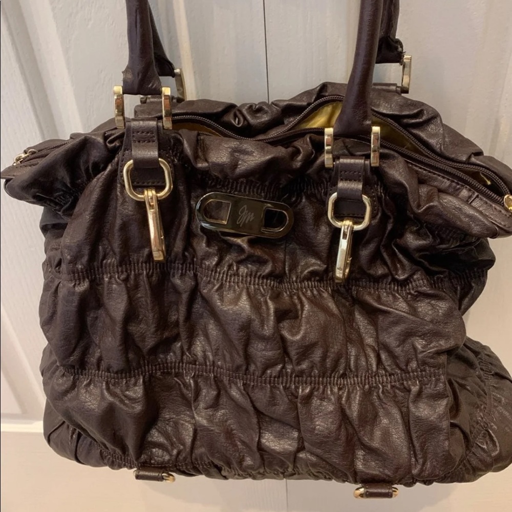 JM collection brown and gold purse